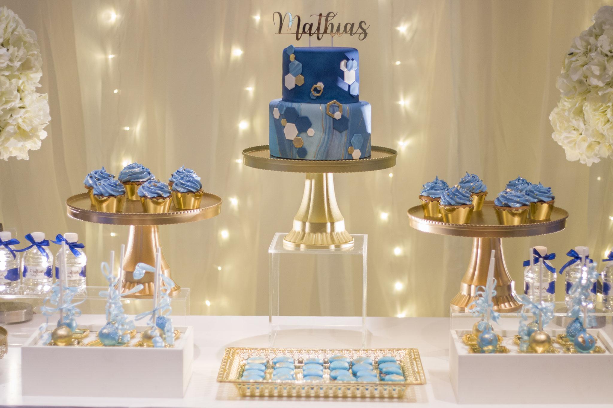 Jungle themed birthday cake and dessert table